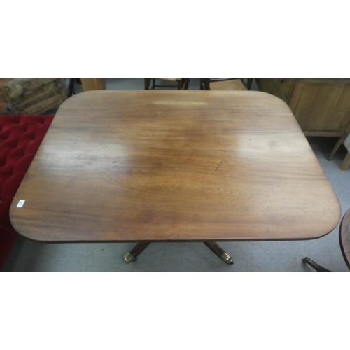 407 - A late Georgian mahogany tip-top breakfast table, over a turned pedestal, raised on a cabriole, quad... 