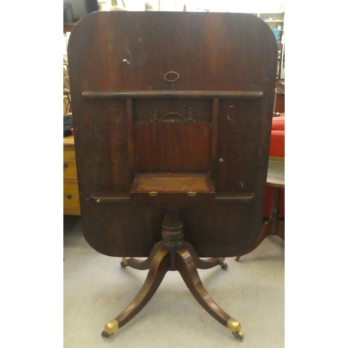 407 - A late Georgian mahogany tip-top breakfast table, over a turned pedestal, raised on a cabriole, quad... 