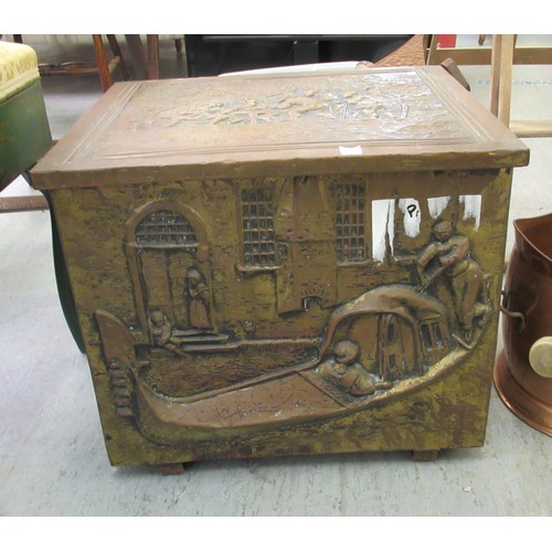 397 - Hearth related items: to include a 1920s oak coal hood; and an embossed, two handles copper log bin ... 