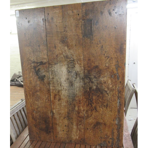 110 - A George III rustic  oak kitchen table, raised on turned, block legs, united by stretchers  28