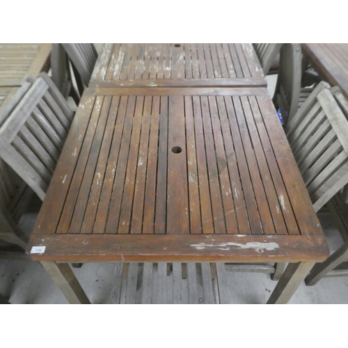 118 - A pair of weathered teak garden tables  29