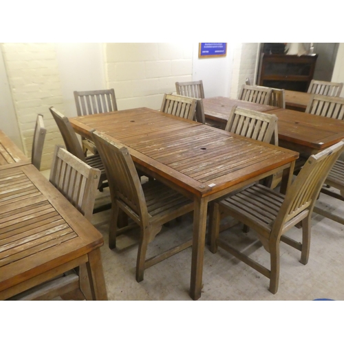 119 - A pair of weathered teak garden tables  29