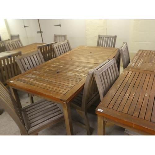 119 - A pair of weathered teak garden tables  29