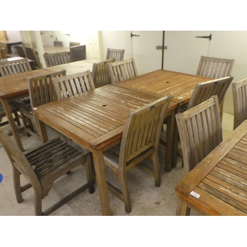 120 - A pair of weathered teak garden tables  29