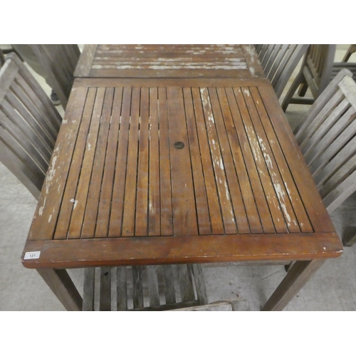 121 - A pair of weathered teak garden tables  29