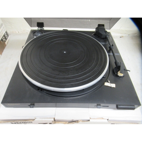 124 - A Pioneer record deck with vinyl albums and 45rpm singles: to include Abba and Neil Diamond