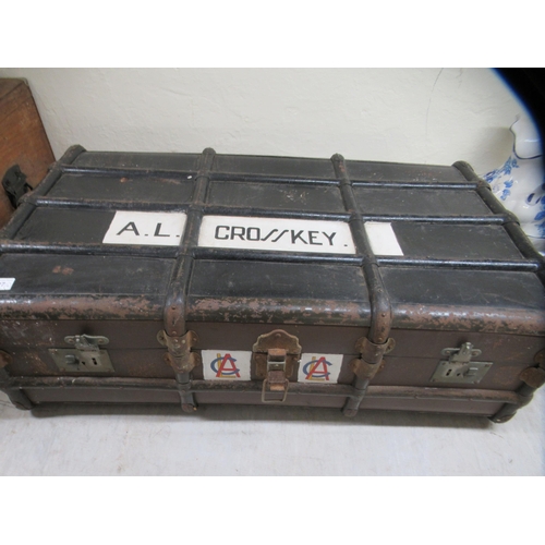 127 - Four various early/mid 20thC trunks: to include a beech bound, canvas example  12