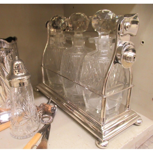 316 - Silver plated table and other wares: to include a late Victorian egg cruet on an attendant stand; an... 