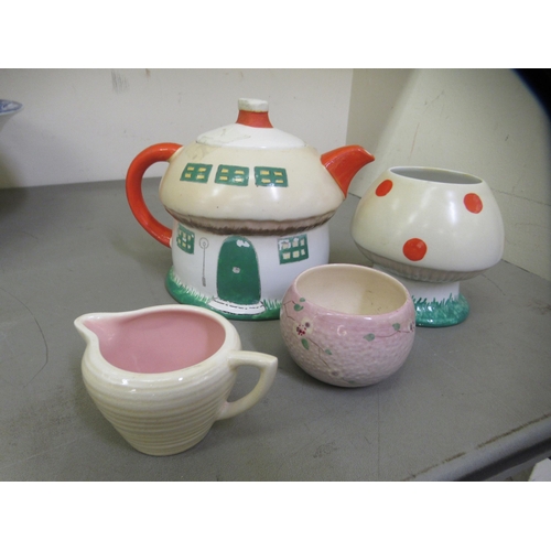 318 - Decorative ceramics: to include a Shelley china novelty Mabel Lucie Attwell teapot and sugar basin; ... 