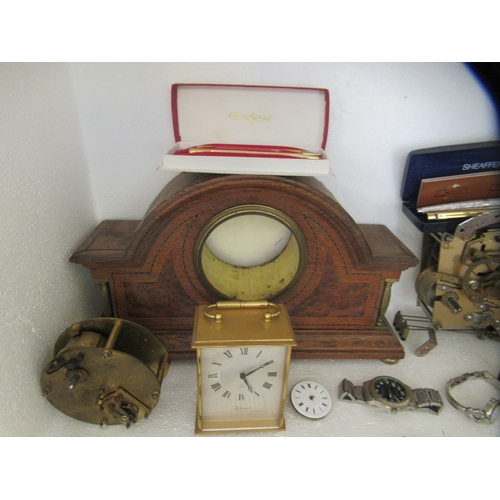 319 - Wristwatches and component parts; a Waterman's pen set; and an Edwardian oak mantel clock case ... 