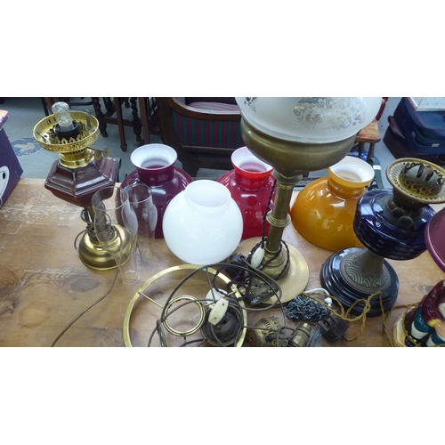 321 - Period and modern lighting: to include oil lamps and coloured ceramic shades 