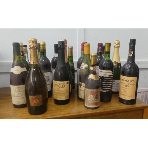 333 - Nineteen bottles of mixed wines and spirits: to include a 1979 Chateau Marquis de Terre; and a bottl... 