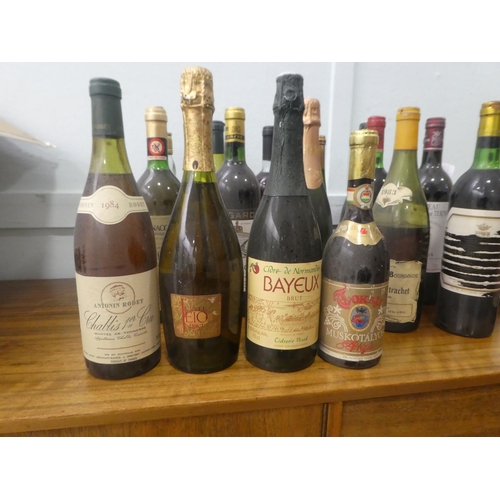 333 - Nineteen bottles of mixed wines and spirits: to include a 1979 Chateau Marquis de Terre; and a bottl... 