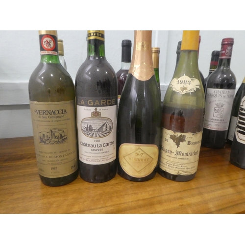 333 - Nineteen bottles of mixed wines and spirits: to include a 1979 Chateau Marquis de Terre; and a bottl... 