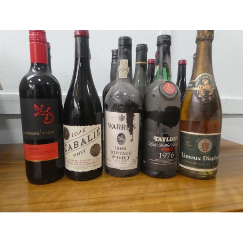 334 - Twenty bottles of mixed wines: to include a 2015 Cabalie; and a 1966 Warres port