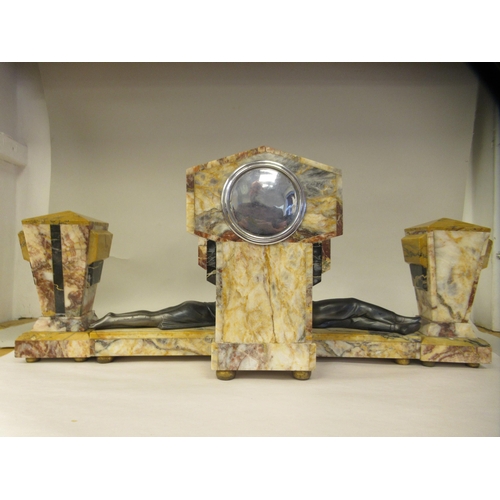 36 - An Art Deco marble and onyx three piece clock garniture, the angular case surmounted by a silvered s... 