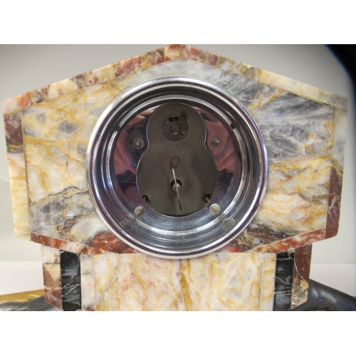 36 - An Art Deco marble and onyx three piece clock garniture, the angular case surmounted by a silvered s... 