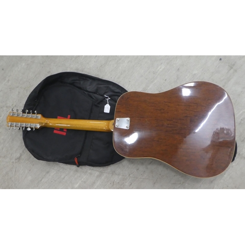 42 - An EKO twelve string accoustic guitar with a soft fabric carrying case 