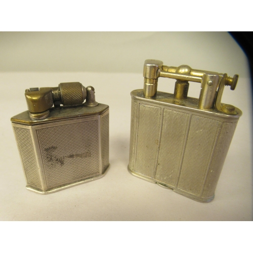 45 - Two vintage silver cased cigarette lighters  mixed marks 