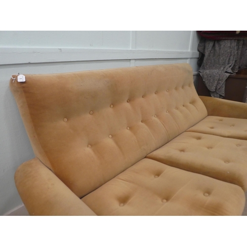 5 - A vintage three person settee, upholstered in soft pink, raised on splayed, stainless steel legs  75... 