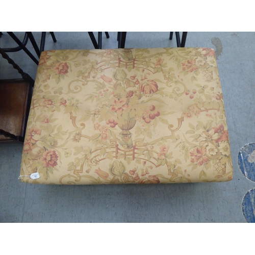 51 - A modern George Smith of Newcastle fabric upholstered footstool, raised on turned legs 