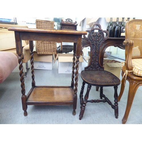 52 - Small furniture: to include an early 20thC carved oak spinning chair 