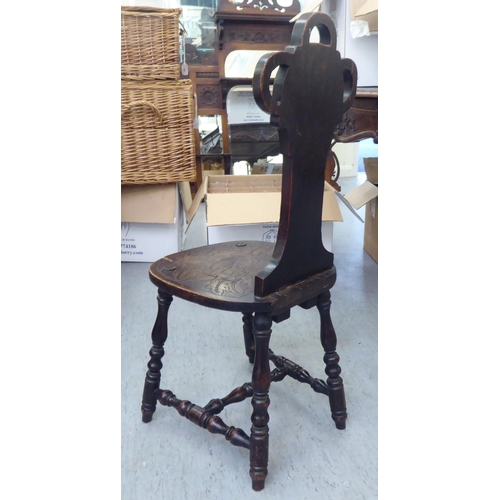 52 - Small furniture: to include an early 20thC carved oak spinning chair 