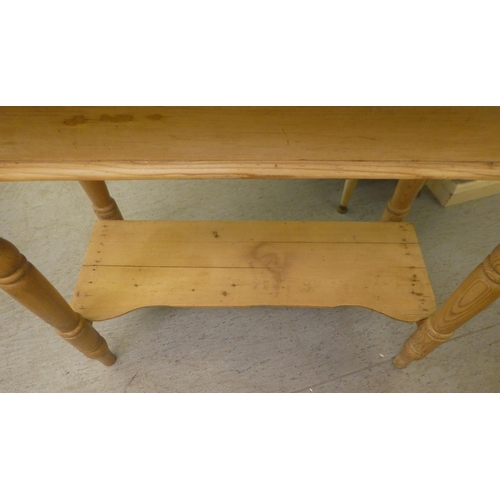 57 - An early 20thC rustic pine washstand, raised on turned legs, united by a platform undershelf  3... 