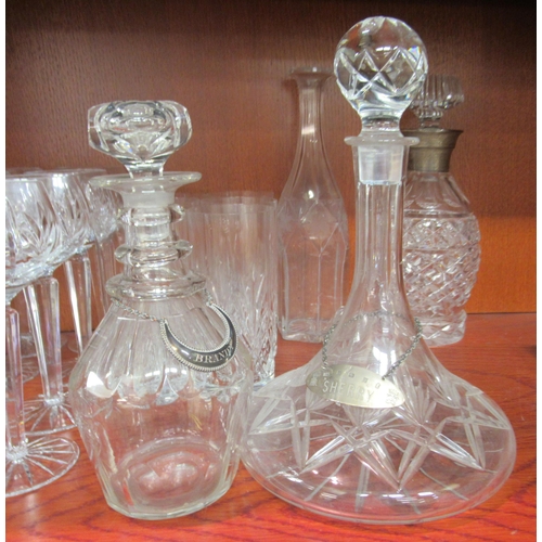 59 - Domestic glassware: to include a cut crystal ships decanter with a silver label, on a chain  Birming... 