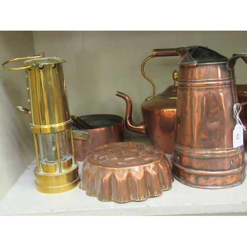 63 - Antique copper and brassware: to include a half gallon jug measure; and an W Thomas & Williams, ... 