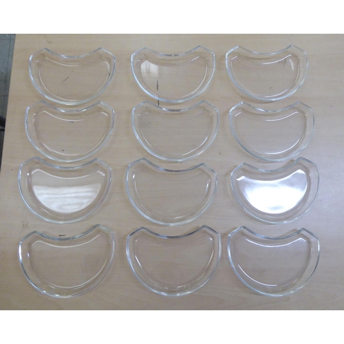 108 - A set of twelve Val St. Lambert glass crescent shaped entrée dishes 