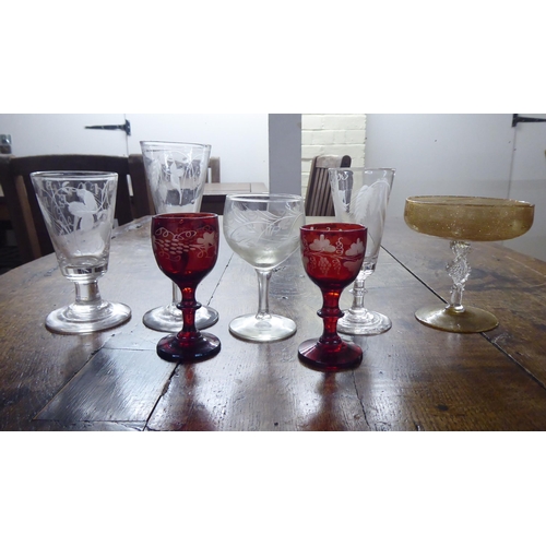 115 - Glassware: to include fruiting etched vine pedestal wines