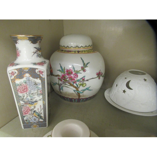 102 - Ceramics: to include a mid 20thC Chinese porcelain vase and cover, decorated with flora and birds&nb... 