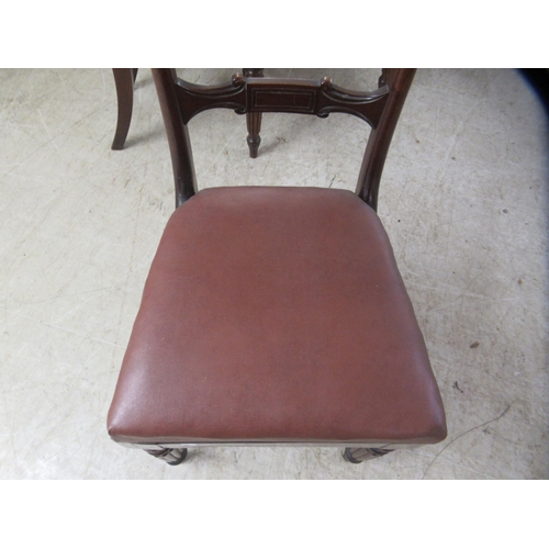 108 - A set of six William IV framed round bar crest dining chairs with carved horizontal splats, the faux... 