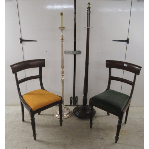 113 - A pair of Victorian mahogany framed round bar crest dining chairs, the upholstered seats raised on t... 