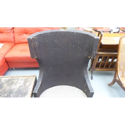 116 - A McGuire Furniture of San Francisco, USA woven caned terrace chair; and a matching footstool