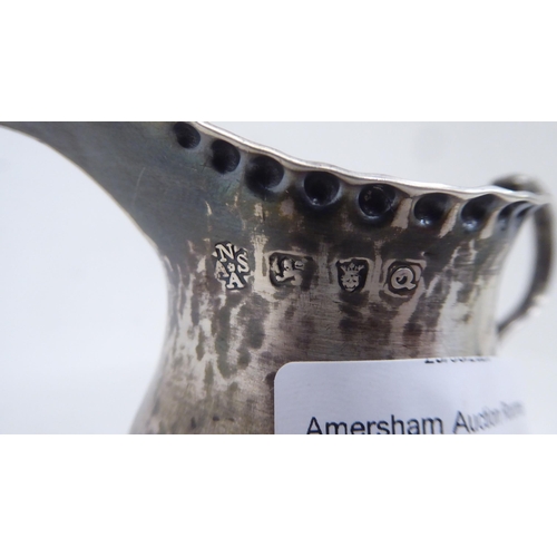 120 - A George III silver pedestal cream jug&nbsp; Nath...??? Appleton & Ann Smith&nbsp; London 1771&n... 