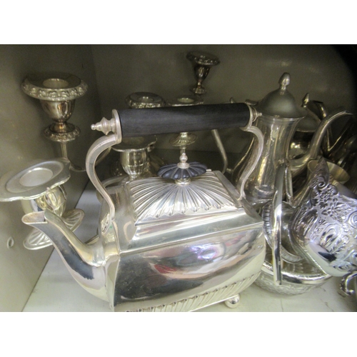33 - &nbsp;Silver plated and stainless steel tableware: to include a Georgian style square kettle and two... 