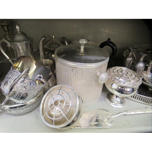 33 - &nbsp;Silver plated and stainless steel tableware: to include a Georgian style square kettle and two... 