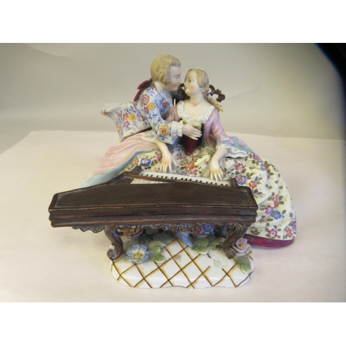 65 - Late 19th/early 20thC Bavarian porcelain figures, viz. a girl wearing a floral dress and bonnet, hol... 