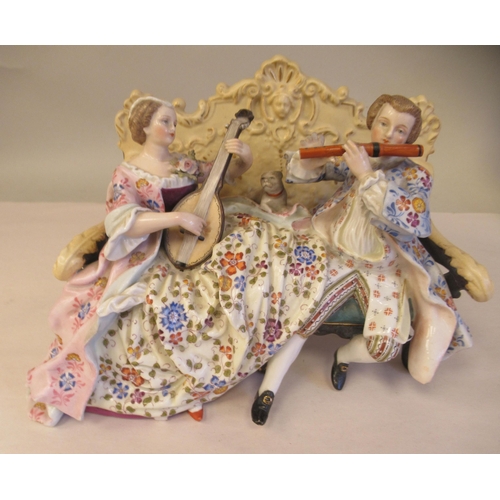 65 - Late 19th/early 20thC Bavarian porcelain figures, viz. a girl wearing a floral dress and bonnet, hol... 