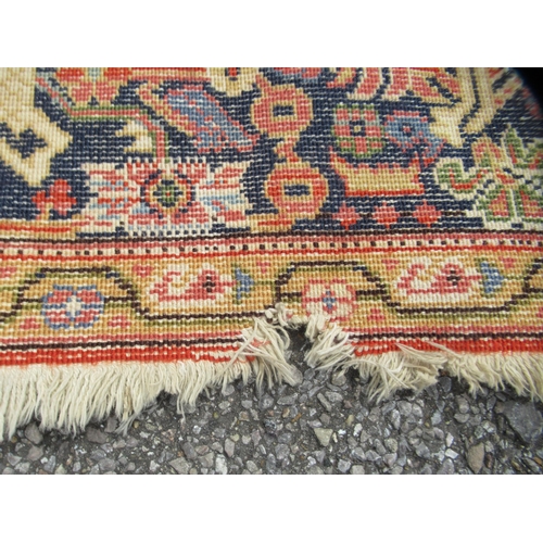 67 - A Persian Bachtia design rug, on a burnt orange and multi-coloured ground&nbsp; 54