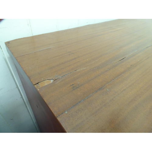 74 - A late Victorian mahogany bow front dressing chest with two short/three long drawers and bun handles... 