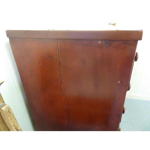 74 - A late Victorian mahogany bow front dressing chest with two short/three long drawers and bun handles... 