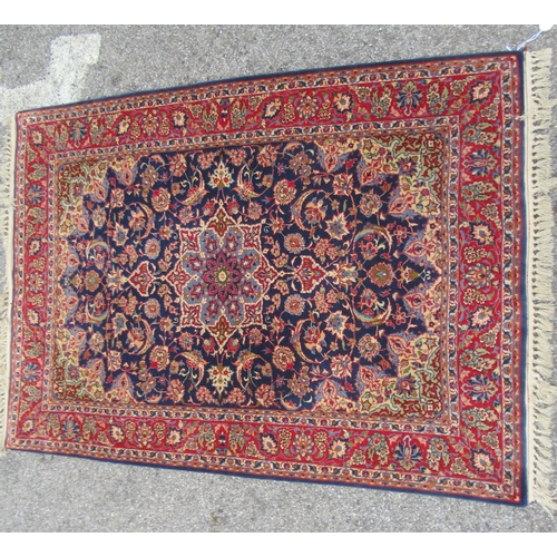 81 - A Persian part silk rug, decorated with a central motif and bordered by floral and foliate designs, ... 