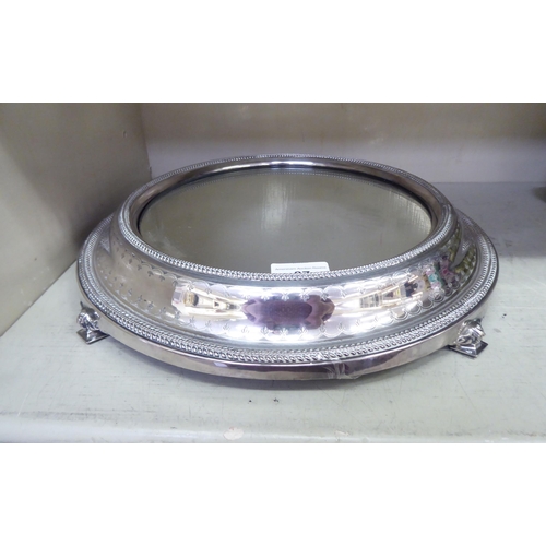 87 - A late Victorian silver plated wedding cake stand with a mirrored top&nbsp; 14