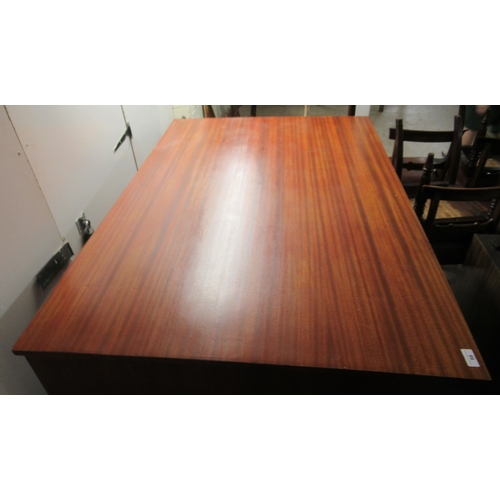 88 - A mid 20thC teak finished two part plan chest, comprising eight equal drawers with recessed metal ha... 