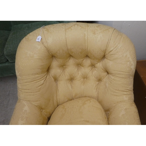 91 - An early 20thC buttoned gold coloured and part buttoned floral patterned and cushion upholstered low... 