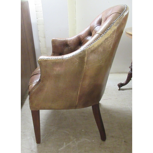 98 - An early 19thC style tub design study chair with a studded and buttoned, mid brown hide back and sea... 