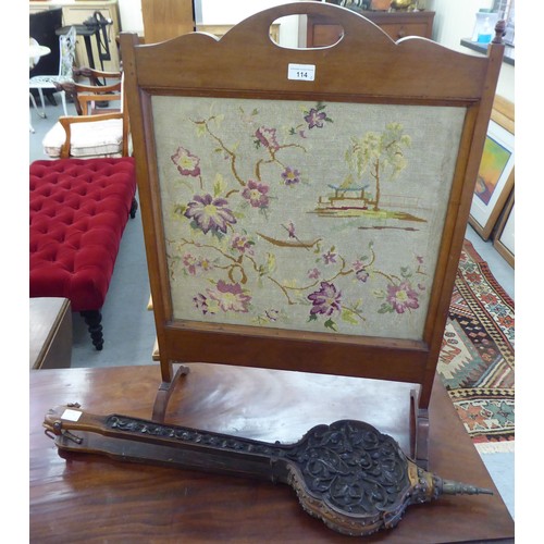 114 - A 1920s mahogany firescreen with a tapestry panel, featuring a Chinese garden and floral  30
